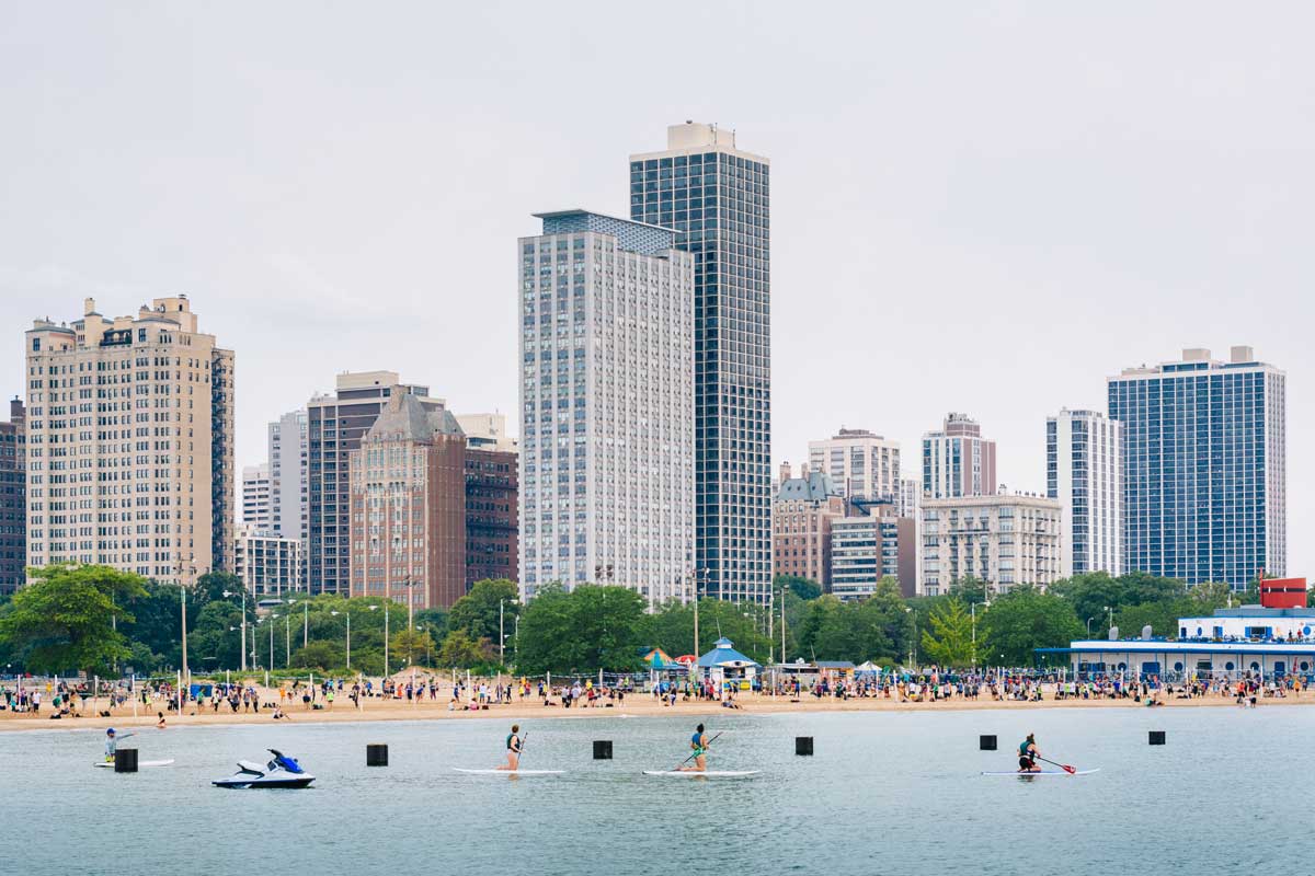 People paddle boarding on Lake Michigan, Chicago